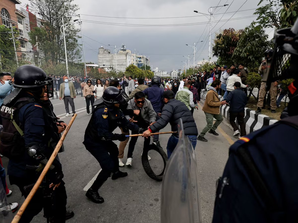 Supporters of Nepal’s former Prime Minister and Communist Party of Nepal Chairman KP Sharma Oli are detained by police during a demonstration after Oli was taken into custody in Kathmandu, Nepal, March 28, 2026. Photo: Reuters