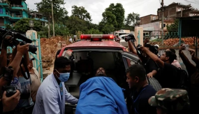 an injured man is rushed to a hospital after devastating floods near nepal china border photo reuters
