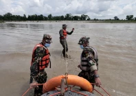 members of the nepal army conduct a search operation for bodies washed away by flash floods and a mudslide in the narayani river chitwan nepal august 31 2026 photo reuters