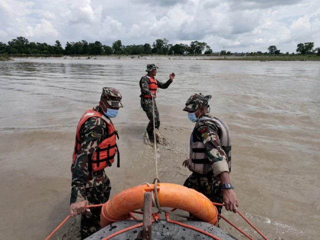 Nepal teams seek hundreds trapped in hydropower tunnels after deadly floods