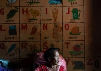 a woman displaced by the deadly flash floods and mudslide sits inside a classroom at a school turned into a temporary shelter in devighat nuwakot district nepal september 5 2026 photo reuters