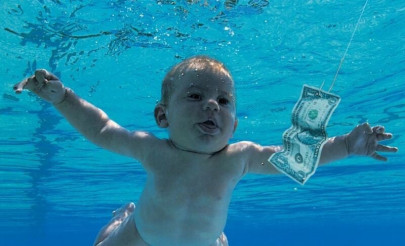 man photographed as baby on the cover of nirvana s nevermind sues for sexual exploitation