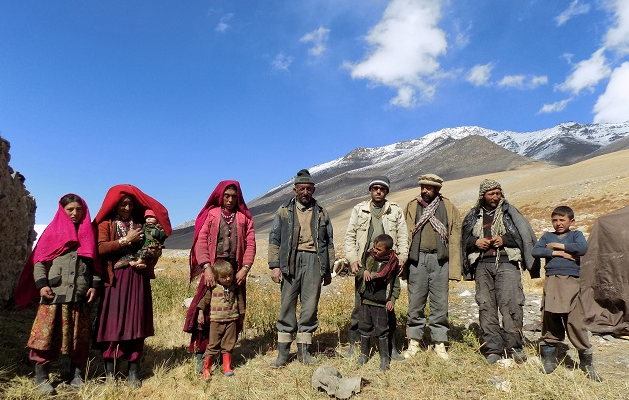 This photograph taken on October 8, 2017 shows Afghan Wakhi nomad family posing for a picture in the Wakhan Corridor in Afghanistan. The region is so remote that its residents, known as the Wakhi - a tribe of roughly 12,000 nomadic people who populate the area - are untouched by decades of conflict devastating their country. [Photo: AFP]