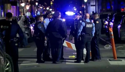 police officers stand at the scene where a truck drove into a large crowd on bourbon street in the french quarter of new orleans louisiana us january 1 2025 in this screengrab taken from a video photo reuters