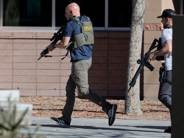 aw enforcement officers head into unlv campus after reports of an active shooter in las vegas nevada photo reuters aw enforcement officers head into unlv campus after reports of an active shooter in las vegas nevada photo reuters