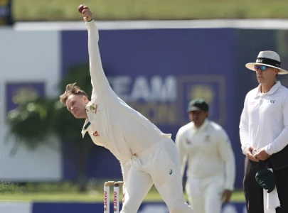australia s matthew kuhnemann reported for suspected illegal bowling