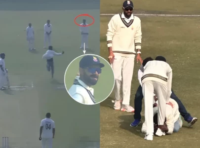 watch fan evades security to touch virat kohli s feet during ranji trophy watch fan evades security to touch virat kohli s feet during ranji trophy