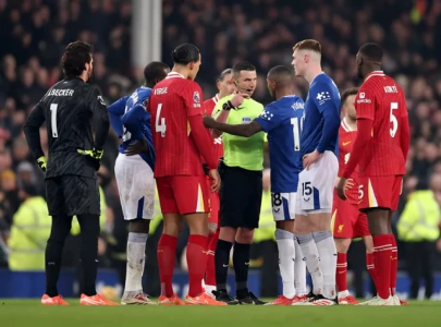 watch chaotic scenes at liverpool vs everton as fans invade the pitch watch chaotic scenes at liverpool vs everton as fans invade the pitch