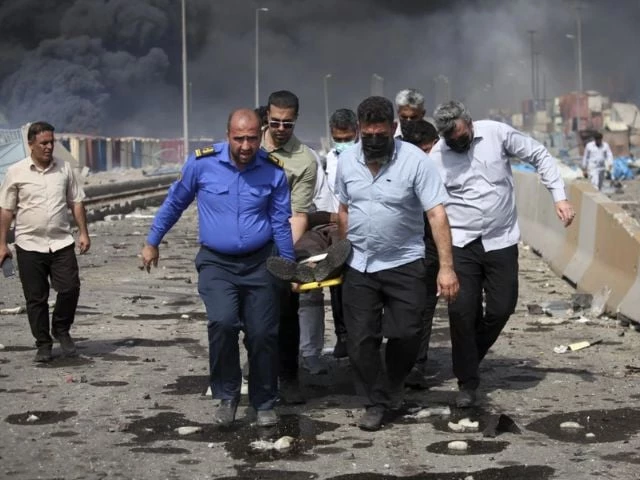 in this photo provided by islamic republic news agency irna men carry an injured man after a massive explosion near the southern port city of bandar abbas iran saturday april 26 2025 mohammad rasoul moradi irna via ap in this photo provided by islamic republic news agency irna men carry an injured man after a massive explosion near the southern port city of bandar abbas iran saturday april 26 2025 photo ap in this photo provided by islamic republic news agency irna men carry an injured man after a massive explosion near the southern port city of bandar abbas iran saturday april 26 2025 mohammad rasoul moradi irna via ap in this photo provided by islamic republic news agency irna men carry an injured man after a massive explosion near the southern port city of bandar abbas iran saturday april 26 2025 photo ap