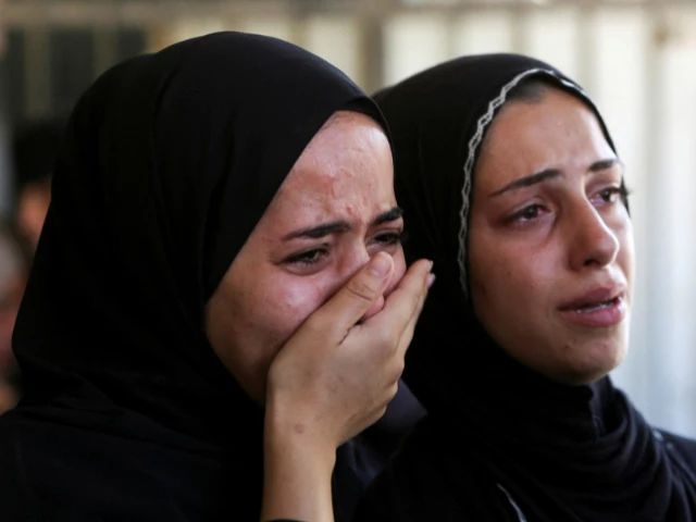 people mourn palestinians who were killed in an incident on wednesday while seeking aid in khan younis at nasser hospital in khan younis in the southern gaza strip july 16 2025 photo reuters people mourn palestinians who were killed in an incident on wednesday while seeking aid in khan younis at nasser hospital in khan younis in the southern gaza strip july 16 2025 photo reuters