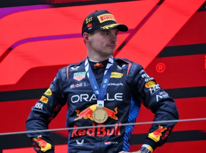 max verstappen confirms he s racing with red bull in 2026