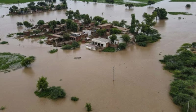 this aerial photograph shows partially submerged houses in the flood affected area of haqu wala village in pakistan s kasur district on august 26 2025 photo afp