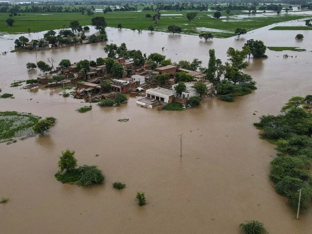 this aerial photograph shows partially submerged houses in the flood affected area of haqu wala village in pakistan s kasur district on august 26 2025 photo afp this aerial photograph shows partially submerged houses in the flood affected area of haqu wala village in pakistan s kasur district on august 26 2025 photo afp