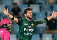 pakistan s shaheen shah afridi r gestures as uae s alishan sharafu looks on during the asia cup 2025 twenty20 international cricket match between united arab emirates and pakistan at the dubai international stadium in dubai on september 17 2025 photo afp