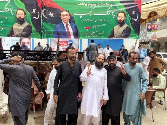voters pose outside a polling station after casting their votes in karachi s uc 8 by elections photo ppi voters pose outside a polling station after casting their votes in karachi s uc 8 by elections photo ppi