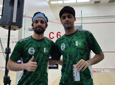 pakistani duo advance to knockouts at asian squash championship