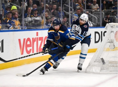 adam lowry s double overtime heroics lead winnipeg jets into second round