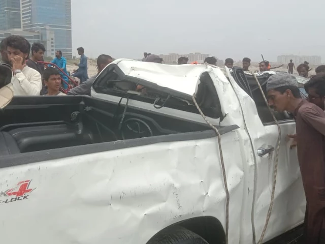 a view of the damaged double cabin vehicle that overturned and sank into the sea at sea view on wednesday night photo express a view of the damaged double cabin vehicle that overturned and sank into the sea at sea view on wednesday night photo express