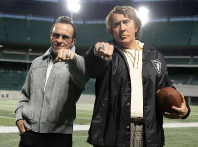 first look at madden released starring nicolas cage and christian bale