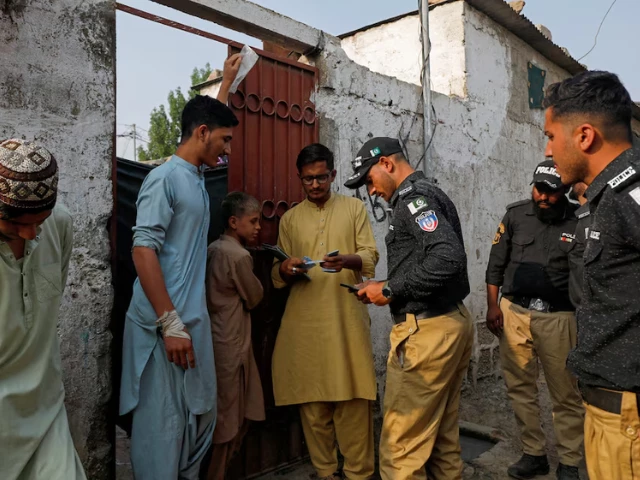 police officers along with workers from the national database and registration authority nadra check the identity cards of afghan citizens during a door to door search and verification drive for undocumented afghan nationals in an afghan camp on the outskirts of karachi pakistan november 21 2023 photo reuters police officers along with workers from the national database and registration authority nadra check the identity cards of afghan citizens during a door to door search and verification drive for undocumented afghan nationals in an afghan camp on the outskirts of karachi pakistan november 21 2023 photo reuters