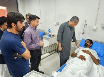 mohsin naqvi visits indian drone attack victim at rawalpindi hospital