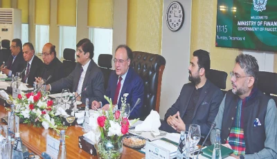 flanked by sindh chief minister murad ali shah and k p chief minister sohail afridi and others finance minister muhammad aurangzeb speaks during a meeting of the national finance commission photo express
