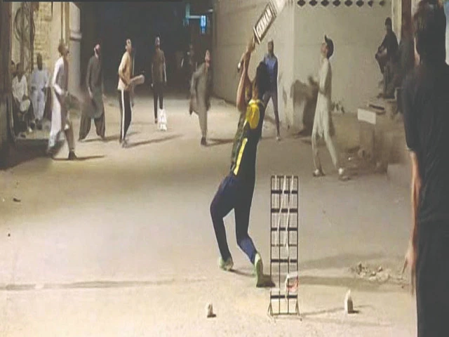 youngsters play cricket on a ramazan night using stolen electricity oblivious of ethical or religious implications photo express youngsters play cricket on a ramazan night using stolen electricity oblivious of ethical or religious implications photo express