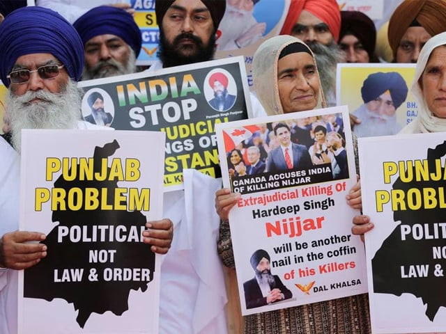 people hold placards protesting the killing of canadian sikh separatist leader hardeep singh nijjar at a demonstration outside the golden temple in amritsar in the northern state of punjab india september 29 2023 photo reuters people hold placards protesting the killing of canadian sikh separatist leader hardeep singh nijjar at a demonstration outside the golden temple in amritsar in the northern state of punjab india september 29 2023 photo reuters
