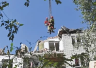amid rubble rescuers work at the site of an apartment building hit by a russian missile strike in lviv ukraine photo reuters