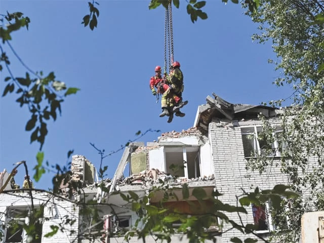amid rubble rescuers work at the site of an apartment building hit by a russian missile strike in lviv ukraine photo reuters amid rubble rescuers work at the site of an apartment building hit by a russian missile strike in lviv ukraine photo reuters
