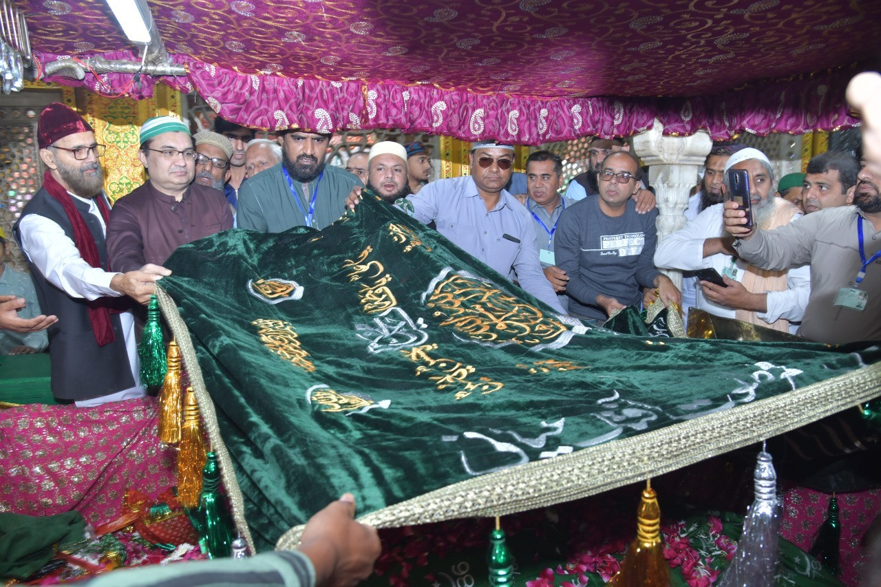 after placing the chaddar special prayers were offered for peace and prosperity of pakistan photo express