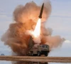 a rocket launcher fires a munition during tests involving an upgraded version of a 240 mm 24 tube multiple rocket launcher system tactical ballistic missiles and a 155 mm self propelled howitzer overseen by north korean leader kim jong un in north korea june 25 2026 photo reuters