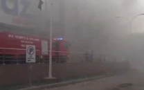 fire erupts at private superstore in karachi s clifton