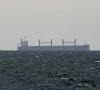 a cargo ship in the gulf near the strait of hormuz as seen from northern ras al khaimah near the border with oman s musandam governance amid the u s  israeli conflict with iran in united arab emirates march 11 2026 photo reuters