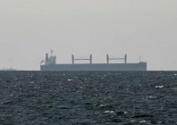 a cargo ship in the gulf near the strait of hormuz as seen from northern ras al khaimah near the border with oman s musandam governance amid the u s  israeli conflict with iran in united arab emirates march 11 2026 photo reuters