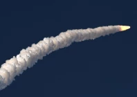 a view of the artemis ii rocket as it blasts off into space leaving behind a trail of white smoke photo anadolu agency