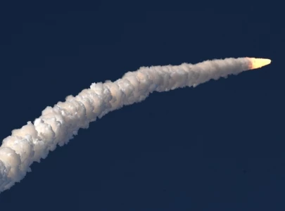 artemis ii astronauts leave earth s orbit set course for the moon