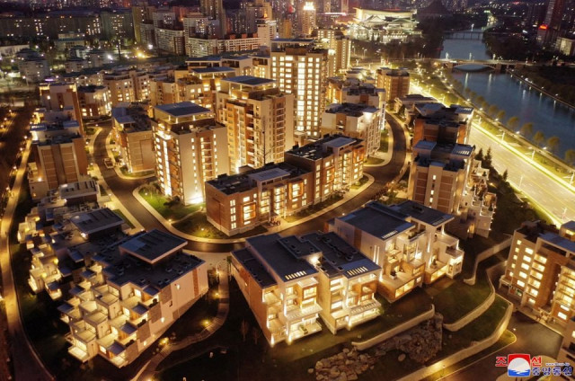 nighttime view of a terraced residential district on a bank of the pothong river in pyongyang north korea in this undated photo released by north korea s korean central news agency kcna april 14 2022 kcna via reuters attention editors this image was provided by a third party reuters is unable to independently verify this image no third party sales south korea out no commercial or editorial sales in south korea nighttime view of a terraced residential district on a bank of the pothong river in pyongyang north korea in this undated photo released by north korea s korean central news agency kcna april 14 2022 kcna via reuters attention editors this image was provided by a third party reuters is unable to independently verify this image no third party sales south korea out no commercial or editorial sales in south korea