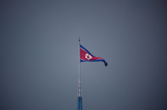 a north korean flag flutters at the propaganda village of gijungdong in north korea in this picture taken near the truce village of panmunjom inside the demilitarized zone dmz separating the two koreas south korea july 19 2022 photo reuters