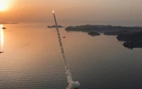 north korean leader kim oversaw test of missiles with cluster warheads