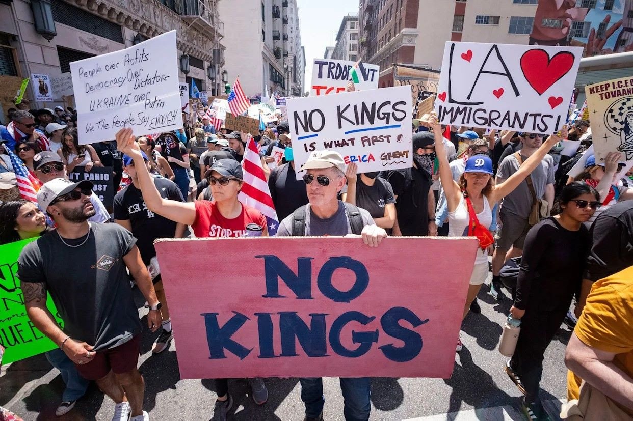 Demonstrators take part in a protest against the Trump administration during the 