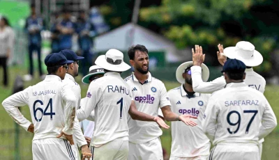 india s prasidh krishna c celebrates with teammates after taking the wicket of sri lanka s kamindu mendis during the third day of the second test at the sinhalese sports club ground in colombo on august 25 2026 photo afp