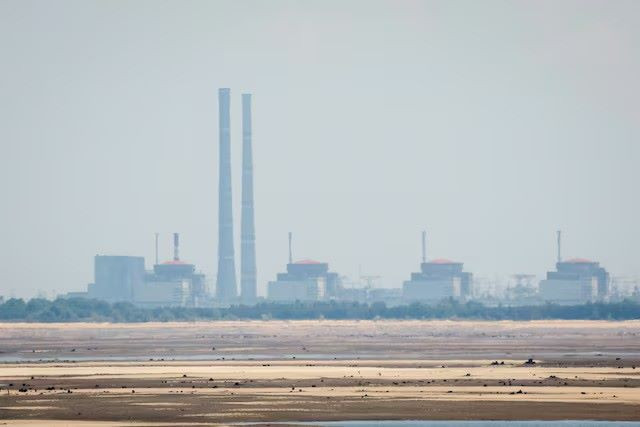 a view shows zaporizhzhia nuclear power plant from the bank of kakhovka reservoir near the town of nikopol after the nova kakhovka dam breached amid russia s attack on ukraine in dnipropetrovsk region ukraine june 16 2023 photo reuters a view shows zaporizhzhia nuclear power plant from the bank of kakhovka reservoir near the town of nikopol after the nova kakhovka dam breached amid russia s attack on ukraine in dnipropetrovsk region ukraine june 16 2023 photo reuters
