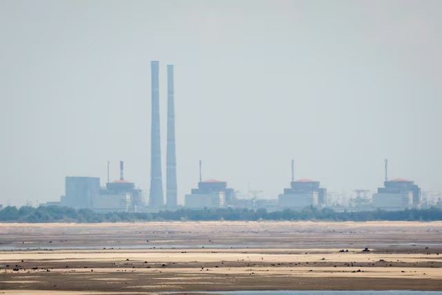 a view shows zaporizhzhia nuclear power plant from the bank of kakhovka reservoir near the town of nikopol after the nova kakhovka dam breached amid russia s attack on ukraine in dnipropetrovsk region ukraine june 16 2023 photo reuters