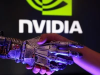 nvidia logo human hand and miniature of 3d printed robot hand are seen in this illustration taken august 27 2025 photo reuters
