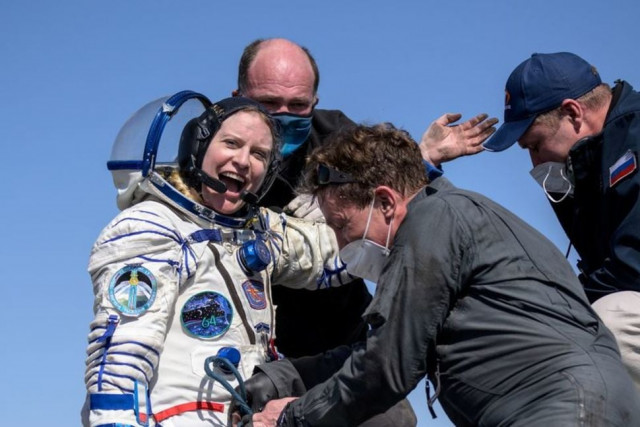 the international space station iss crew member kathleen rubins of nasa reacts shortly after the landing of the soyuz ms 17 space capsule in a remote area outside zhezkazgan kazakhstan april 17 2021 photo reuters the international space station iss crew member kathleen rubins of nasa reacts shortly after the landing of the soyuz ms 17 space capsule in a remote area outside zhezkazgan kazakhstan april 17 2021 photo reuters