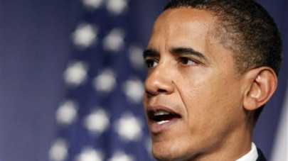 under attack obama holds cards on afghan pullout date