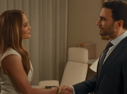 jennifer lopez and brett goldstein spark chemistry in office romance trailer