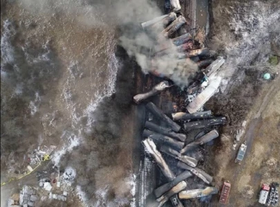 derailed train cars in ohio drained of toxic chemical