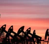 sunset clouds glow over pump jacks at the airankol oil field operated by caspiy neft in the atyrau region kazakhstan april 21 2026 photo reuters